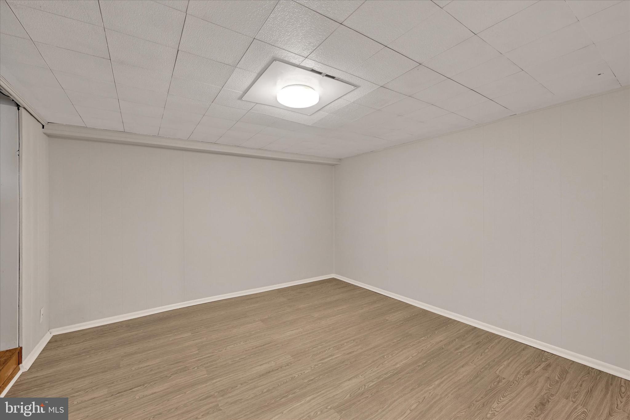 1945 Ormand Road Baltimore, MD 21222 - Photo 19 of 28 a view of a room with wooden floor