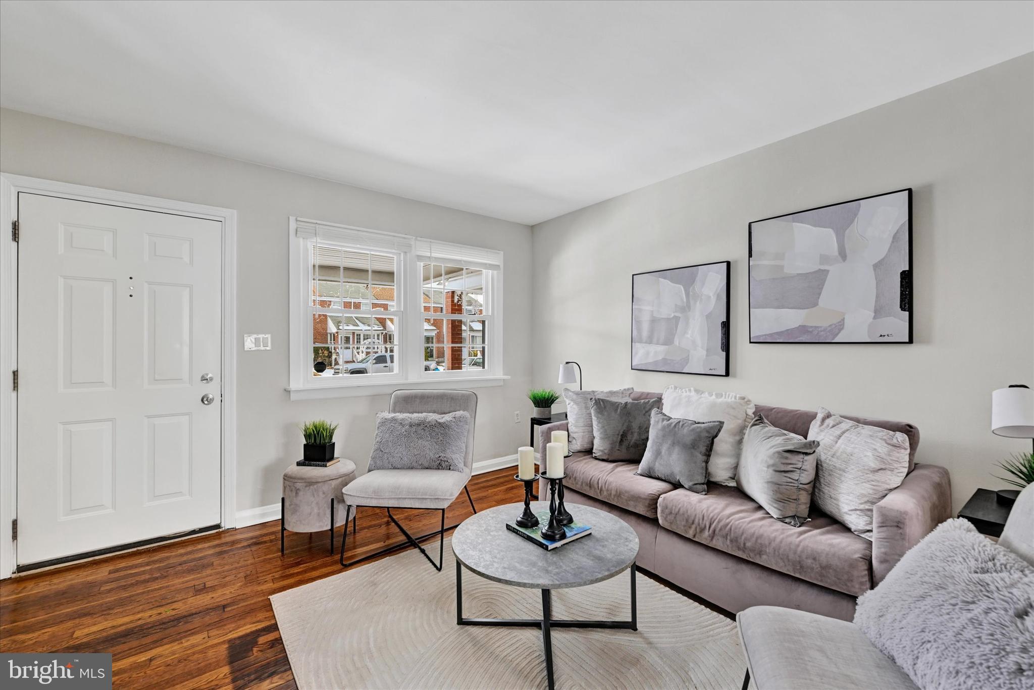 1945 Ormand Road Baltimore, MD 21222 - Photo 3 of 28 a living room with furniture and wooden floor