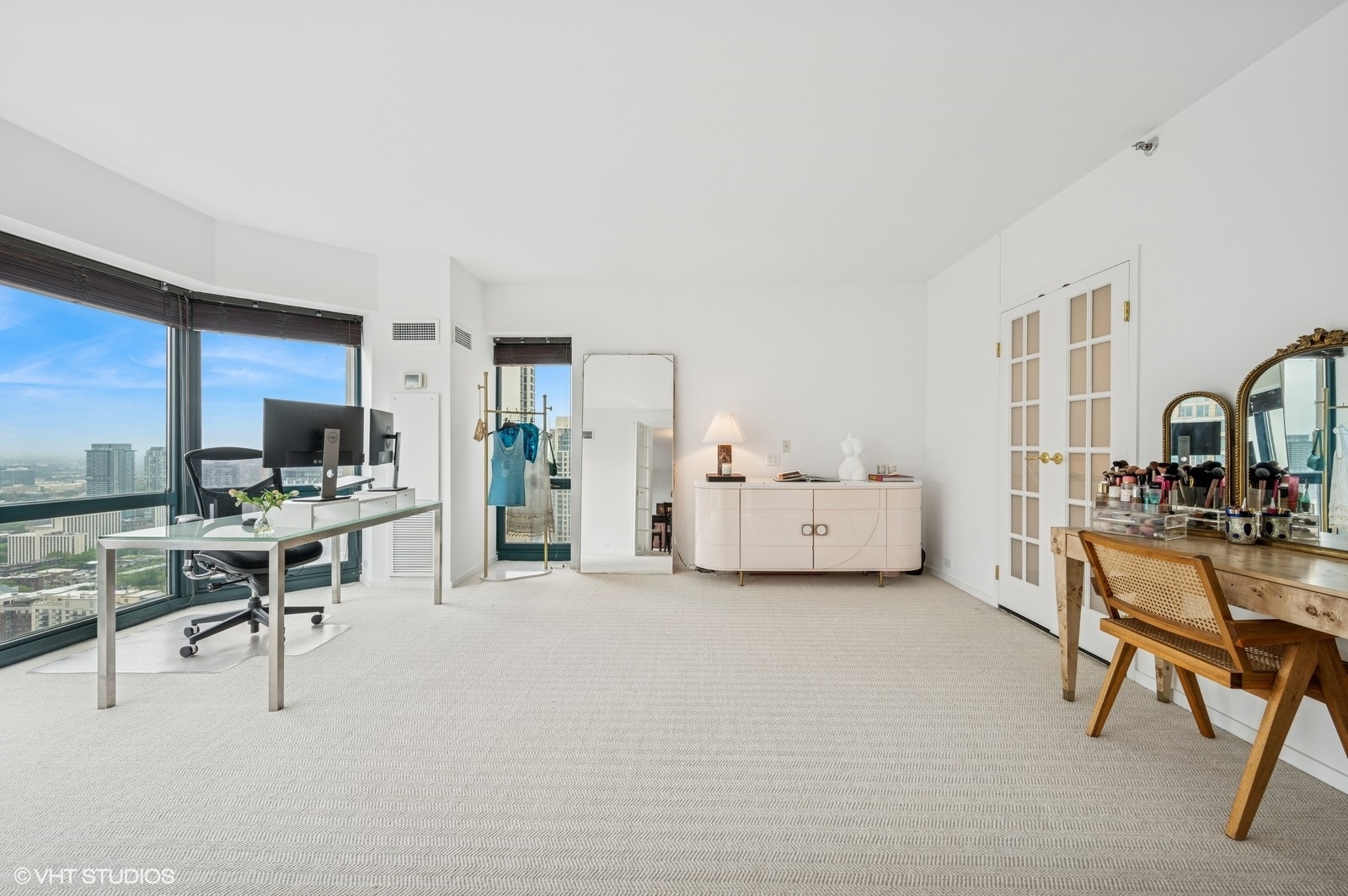 100 East Huron Street, Unit 3501 Chicago, IL 60611 - Photo 12 of 30 a view of a livingroom with workspace and a couch