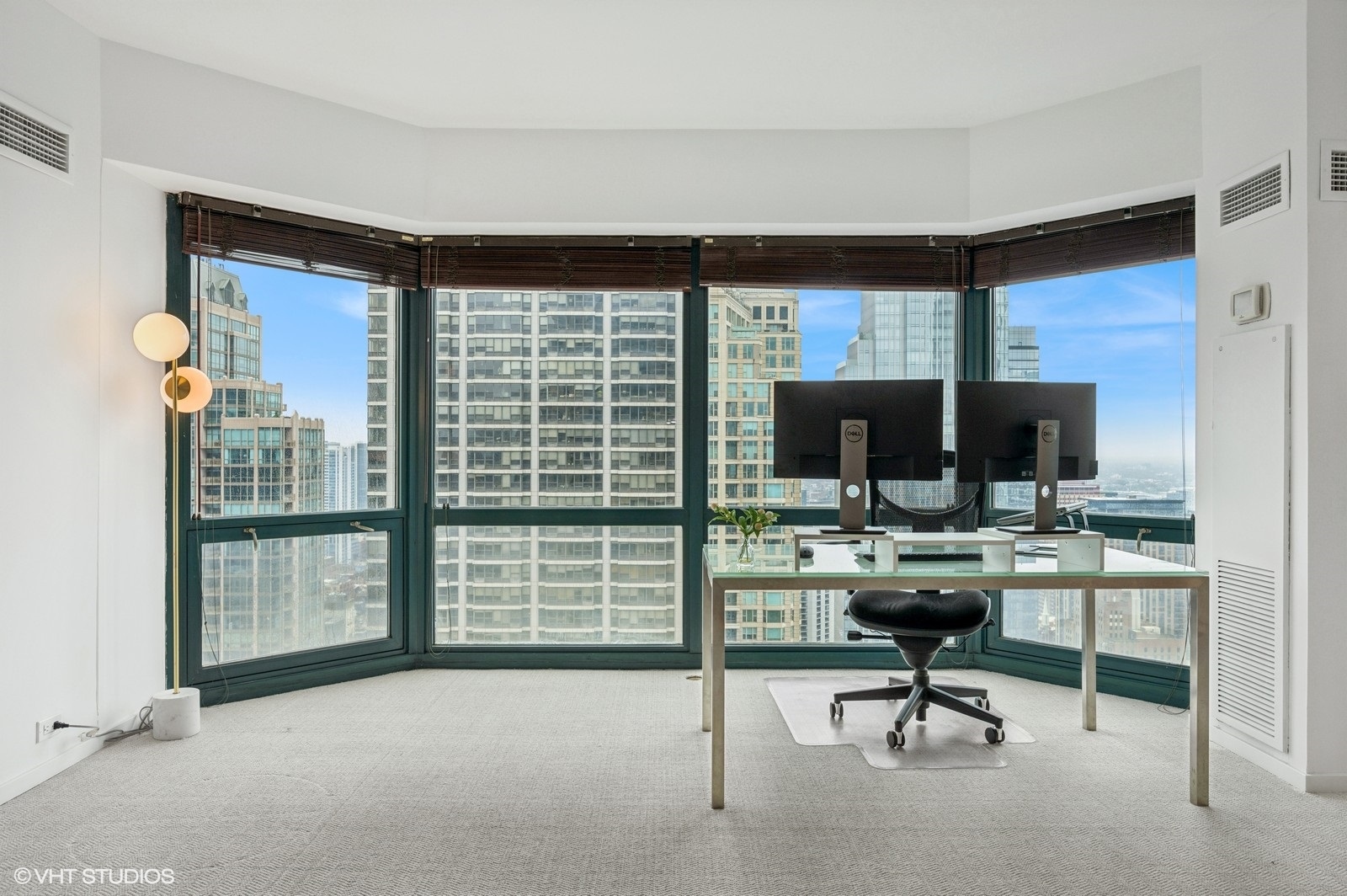 100 East Huron Street, Unit 3501 Chicago, IL 60611 - Photo 13 of 30 a living room with furniture a rug and a flat screen tv