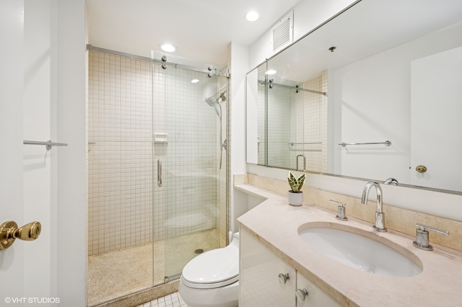 100 East Huron Street, Unit 3501 Chicago, IL 60611 - Photo 21 of 30 a bathroom with a sink toilet double vanity and shower