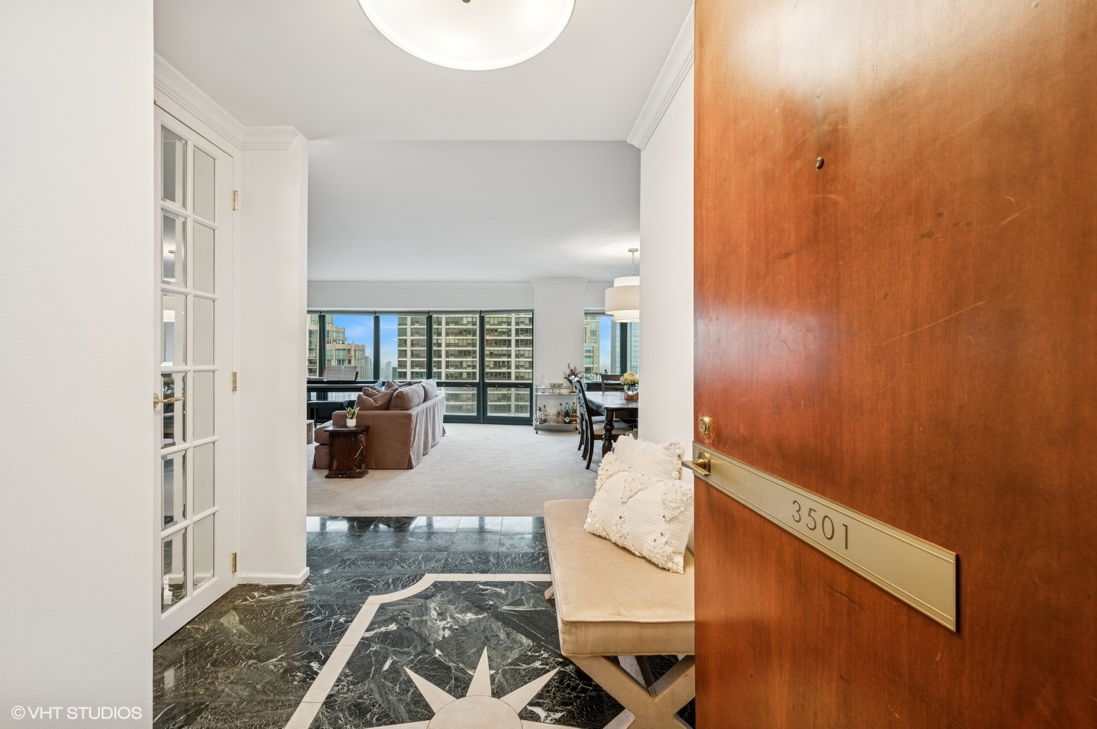 100 East Huron Street, Unit 3501 Chicago, IL 60611 - Photo 24 of 30 a living room with furniture