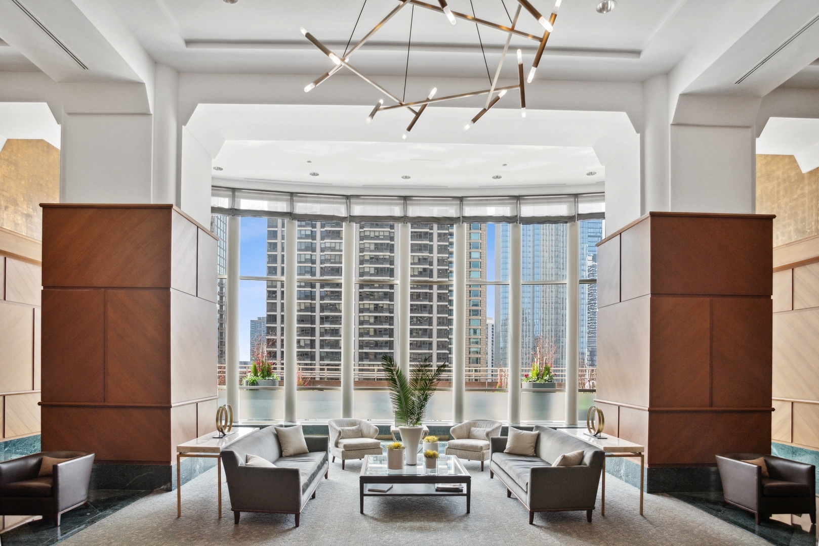 100 East Huron Street, Unit 3501 Chicago, IL 60611 - Photo 25 of 30 a living room with furniture and large windows