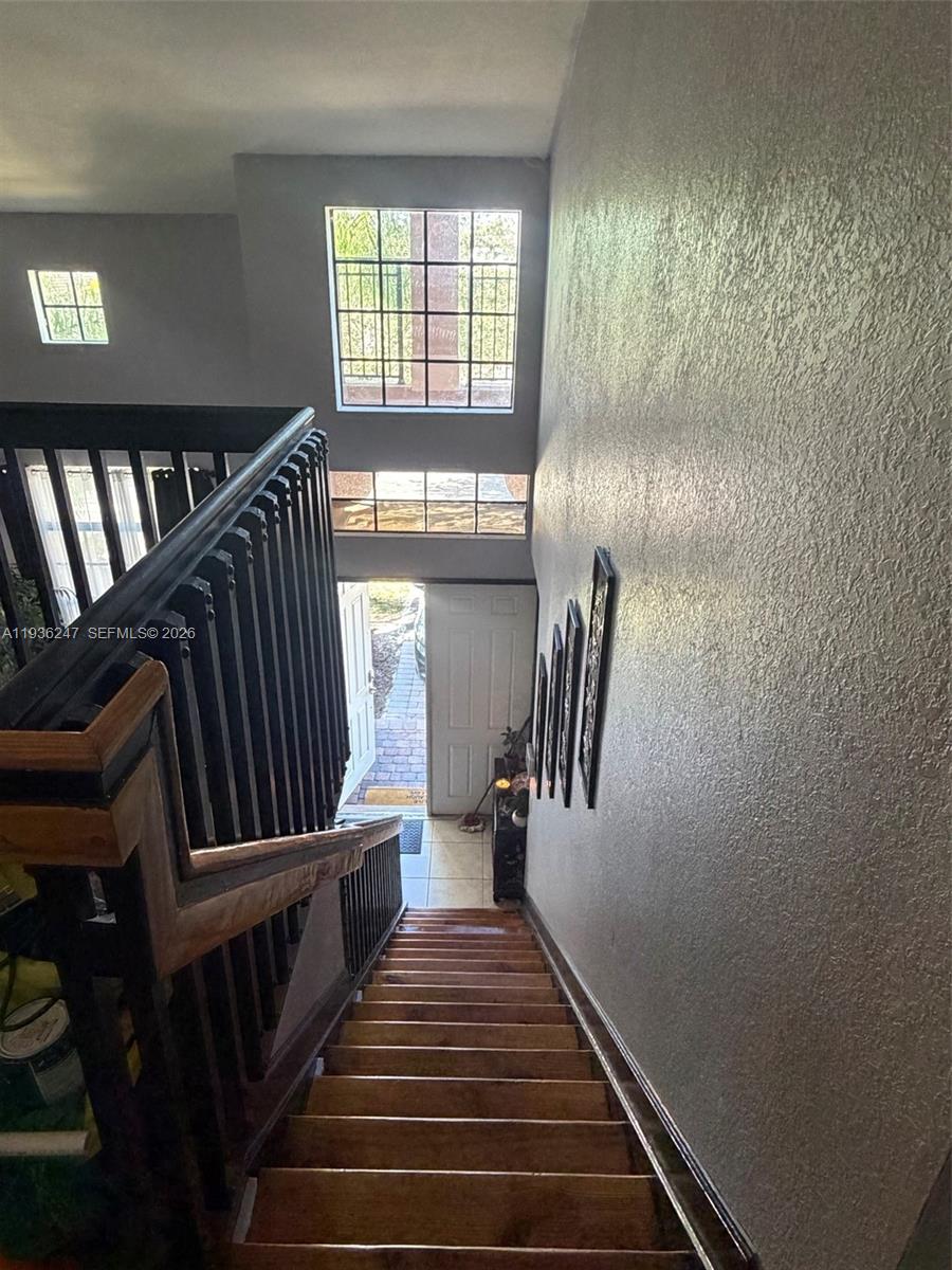 685 Southeast 37th Place Homestead, FL 33033 - Photo 4 of 11 a view of entryway and hall with wooden floor