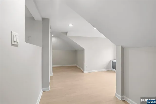 an empty room with a bathroom