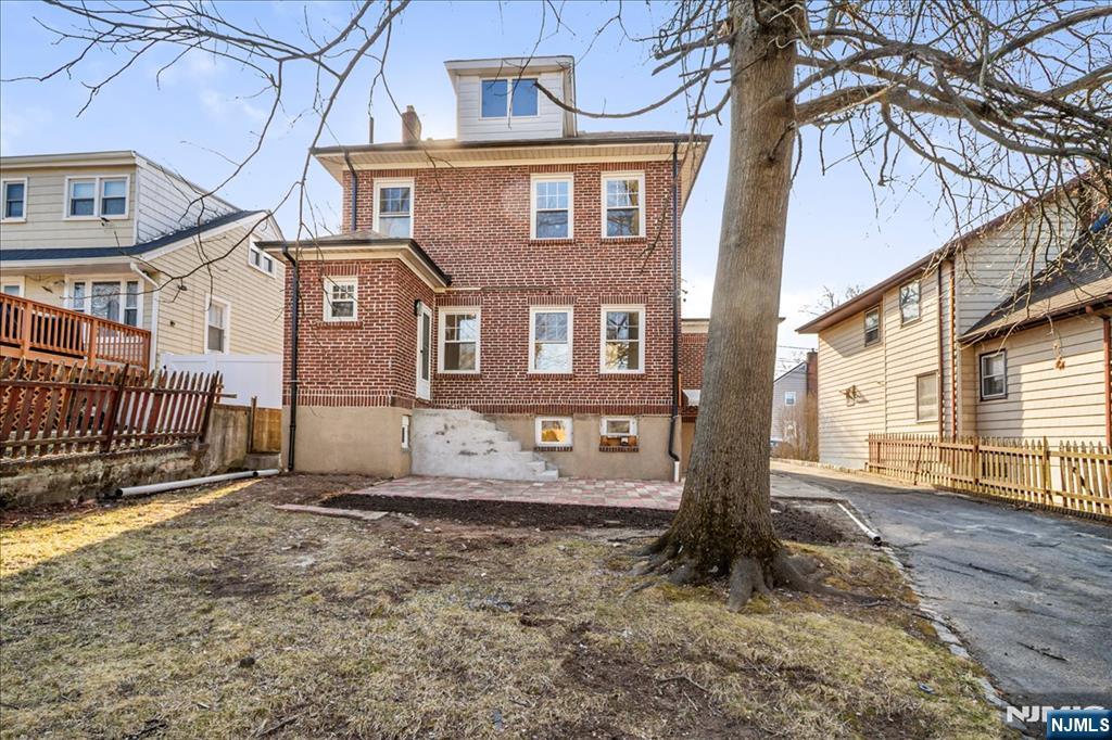 33 Robertson Road West Orange, NJ 07052 - Photo 36 of 48 a front view of a house with a yard