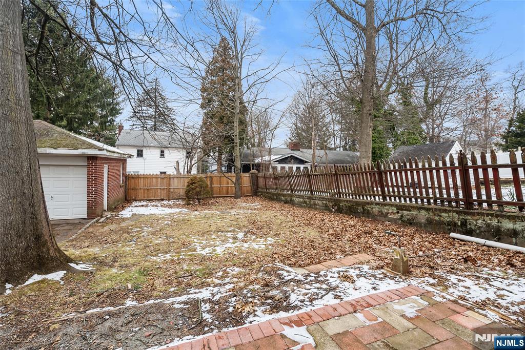 33 Robertson Road West Orange, NJ 07052 - Photo 38 of 48 a view of a backyard with a large tree