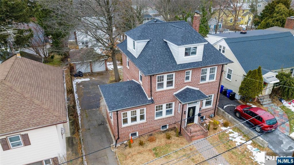 33 Robertson Road West Orange, NJ 07052 - Photo 42 of 48 a front view of a house with a yard