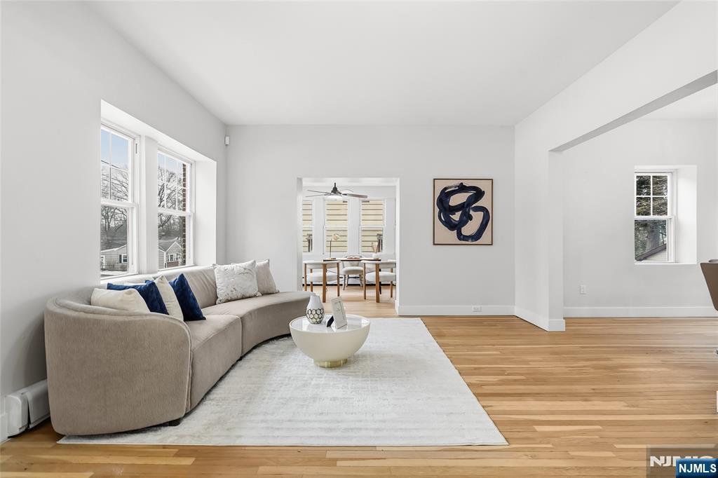 33 Robertson Road West Orange, NJ 07052 - Photo 5 of 48 a living room with furniture and a large window