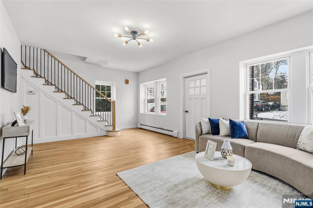 33 Robertson Road West Orange, NJ 07052 - Photo 6 of 48 a living room with furniture and wooden floor