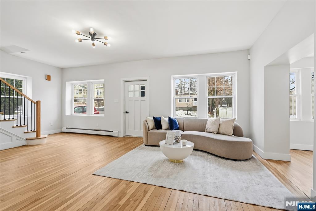 33 Robertson Road West Orange, NJ 07052 - Photo 9 of 48 a living room with furniture and a window