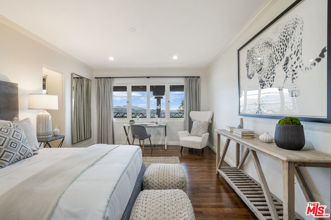 861 Cavanagh Road Glendale, CA 91207 - Photo 13 of 21 a living room with furniture and a large window