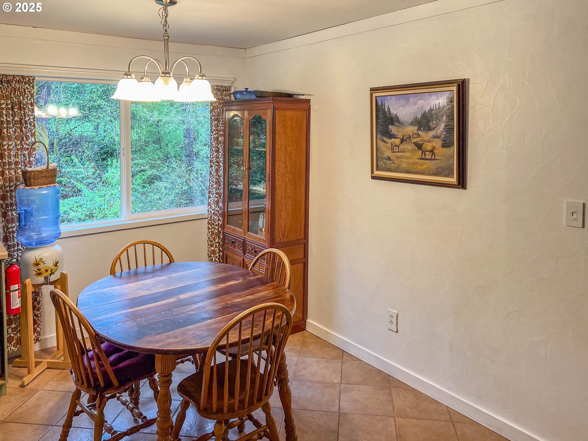 178 Council Creek Road Riddle, OR 97469 - Photo 3 of 14 a view of a dining room with furniture window and outside view