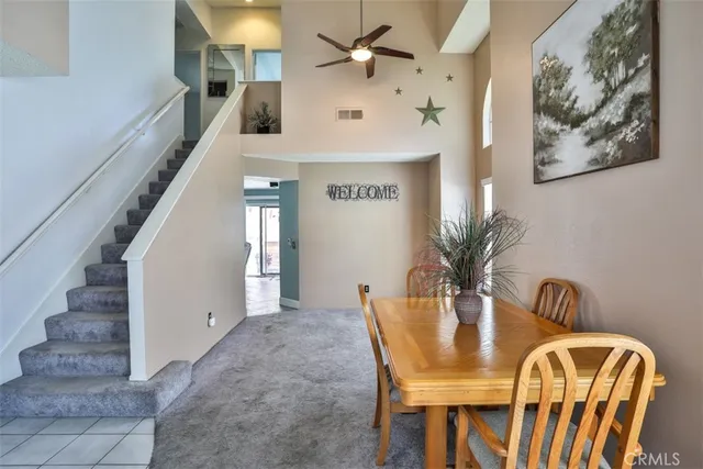 a blue chair sitting in front of a door