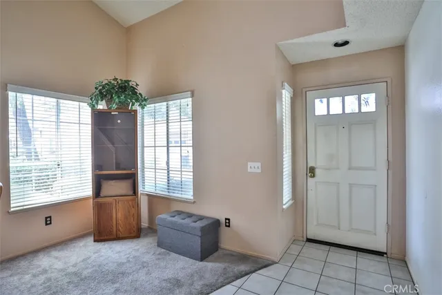 a view of a swimming pool with chairs