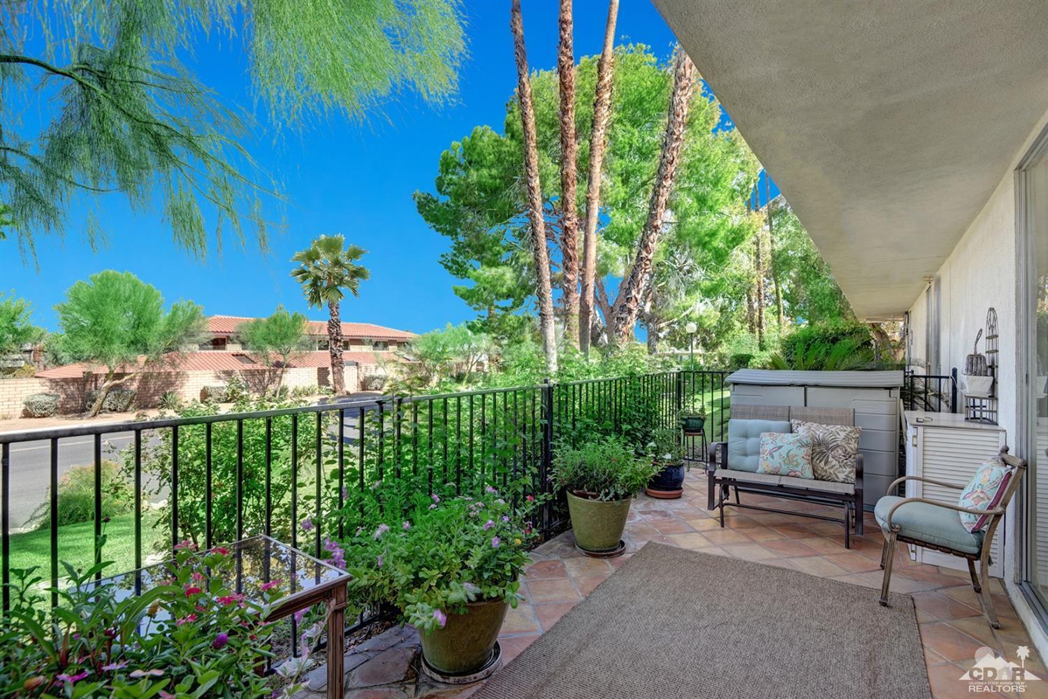 42278 Dunes View Road, Unit 27 Rancho Mirage, CA 92270 - Photo 2 of 20 a garden view with a seating space