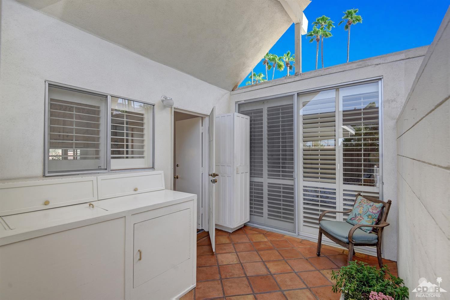 42278 Dunes View Road, Unit 27 Rancho Mirage, CA 92270 - Photo 11 of 20 a workspace with furniture and window