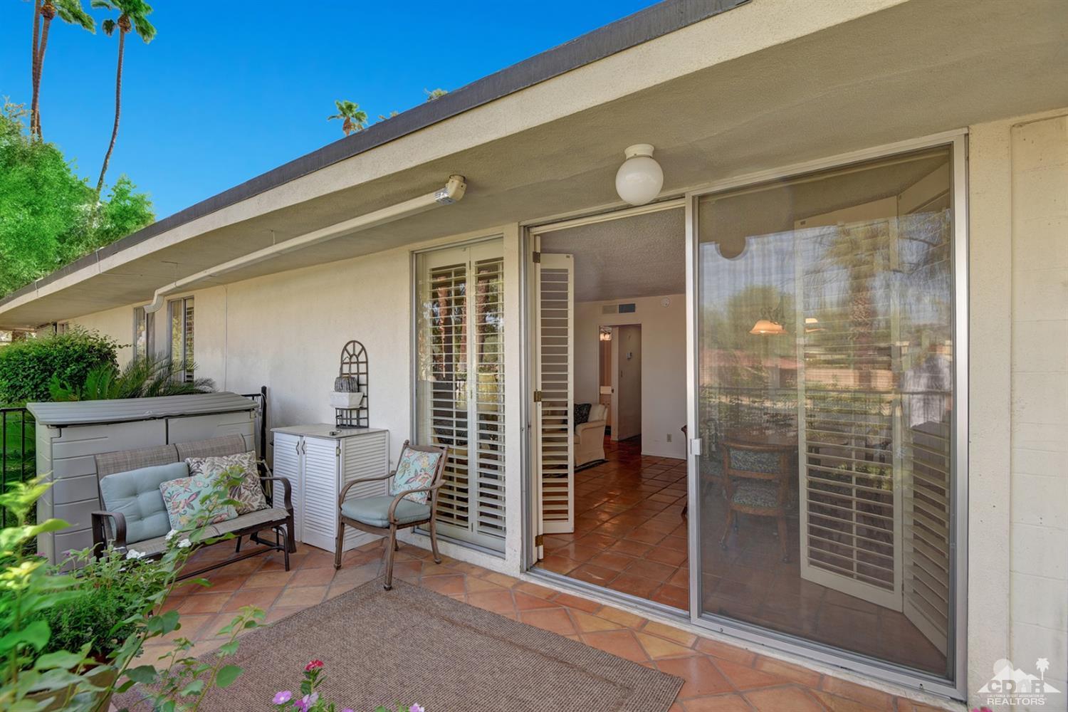42278 Dunes View Road, Unit 27 Rancho Mirage, CA 92270 - Photo 3 of 20 a view of a porch with furniture