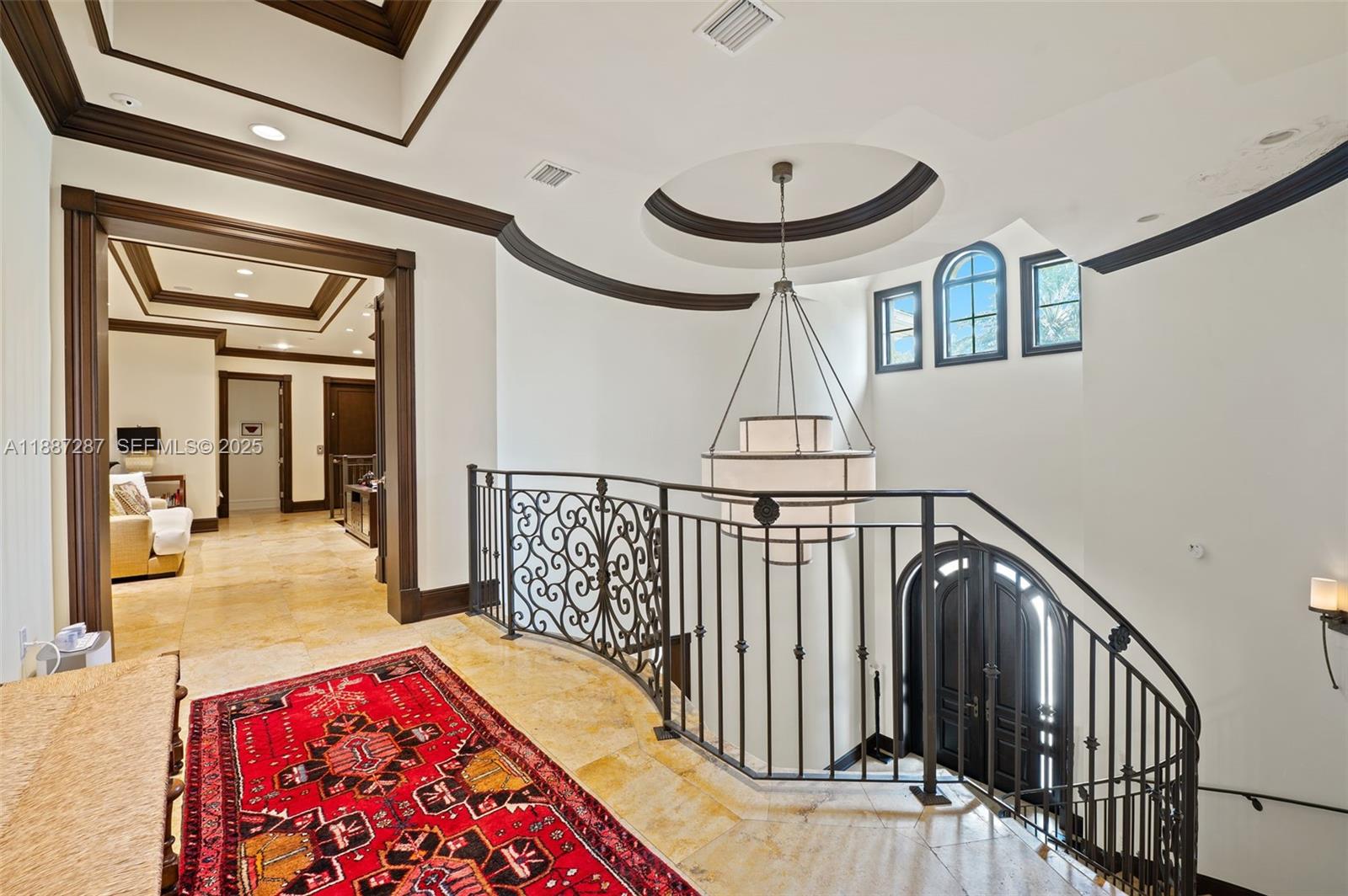 9601 Southwest 60th Court Pinecrest, FL 33156 - Photo 21 of 61 a view of entryway and hall