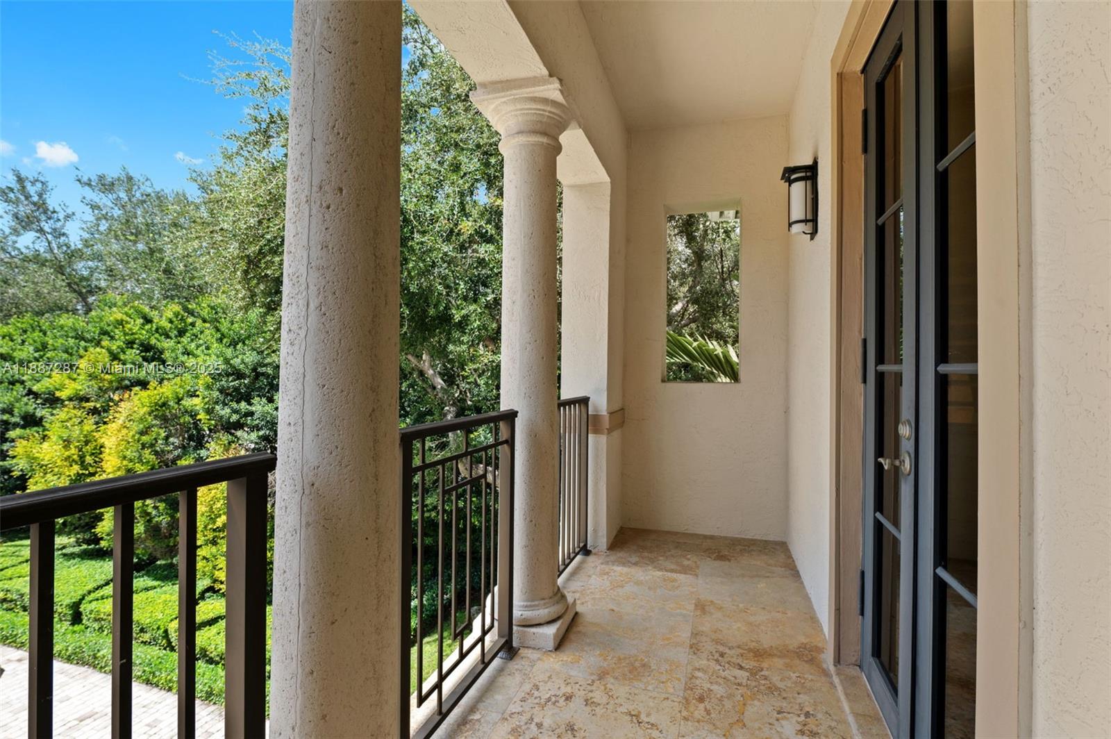 9601 Southwest 60th Court Pinecrest, FL 33156 - Photo 30 of 61 a view of a front door