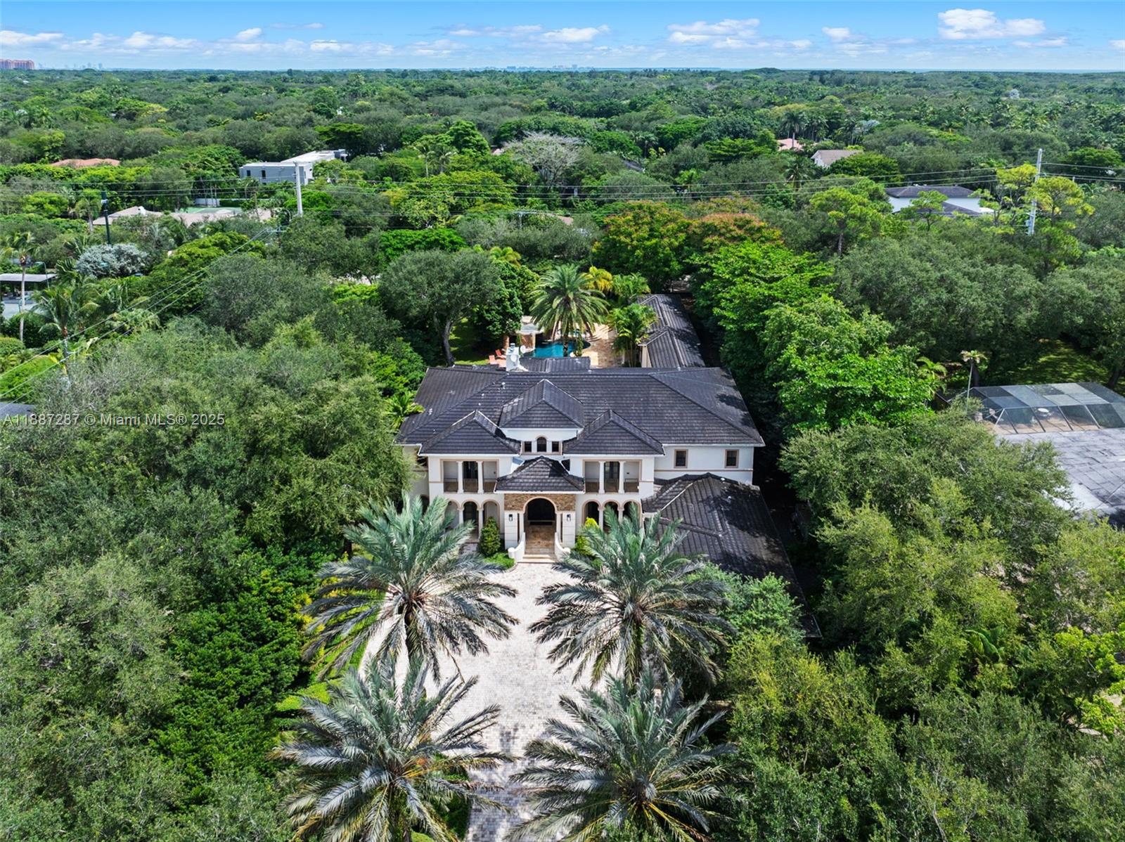 9601 Southwest 60th Court Pinecrest, FL 33156 - Photo 3 of 61 an aerial view of multiple house