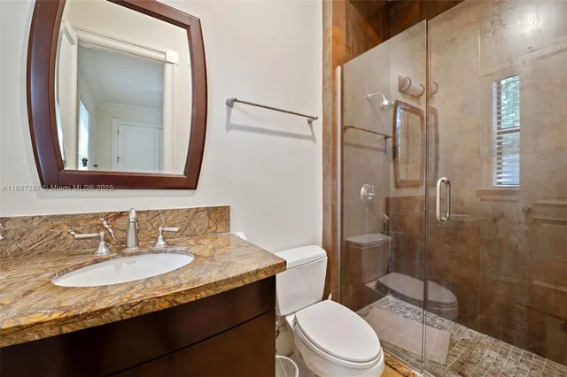 an aerial view of a house with a garden