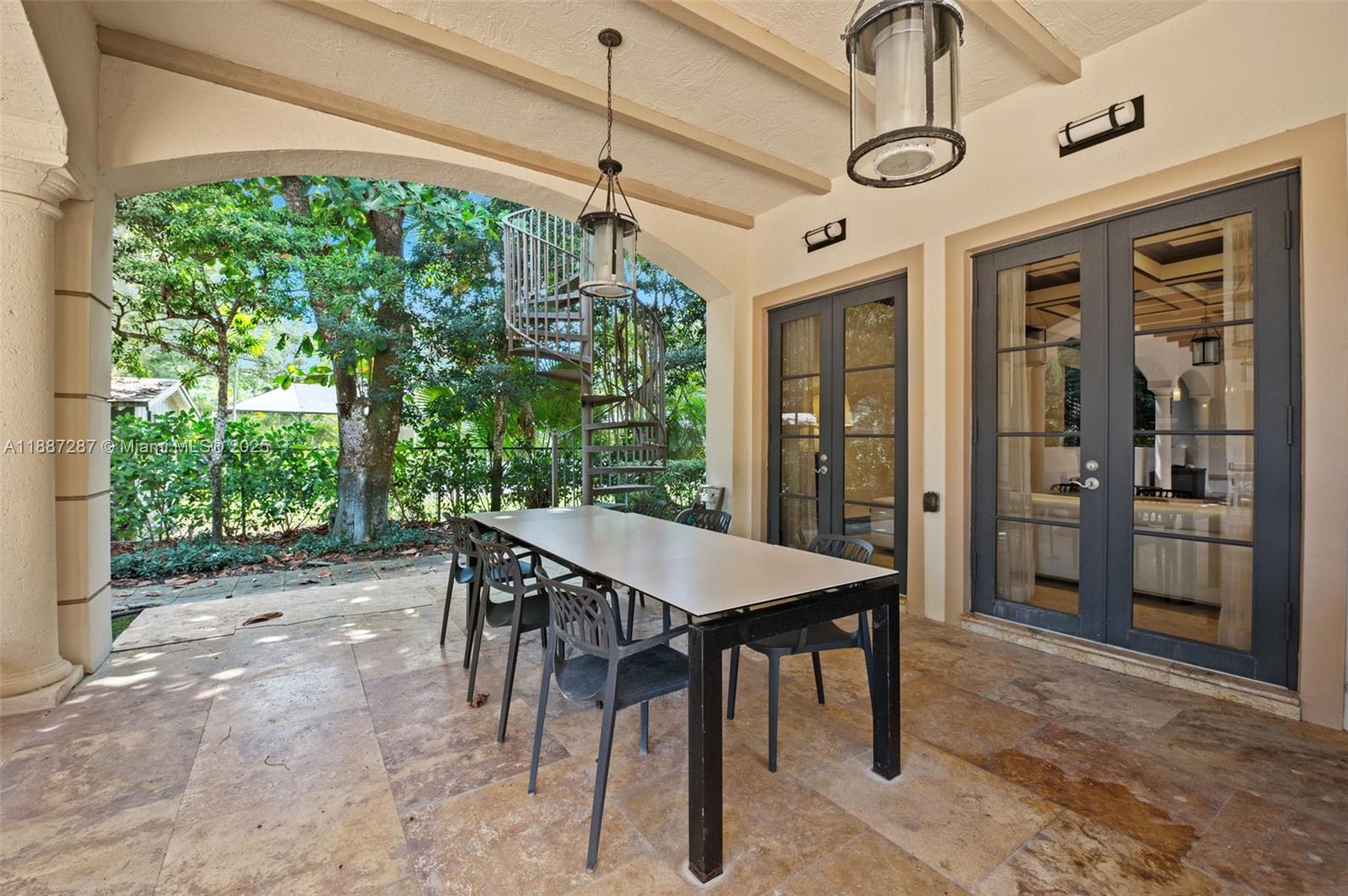 9601 Southwest 60th Court Pinecrest, FL 33156 - Photo 48 of 61 a view of a dining room with furniture window and outside view