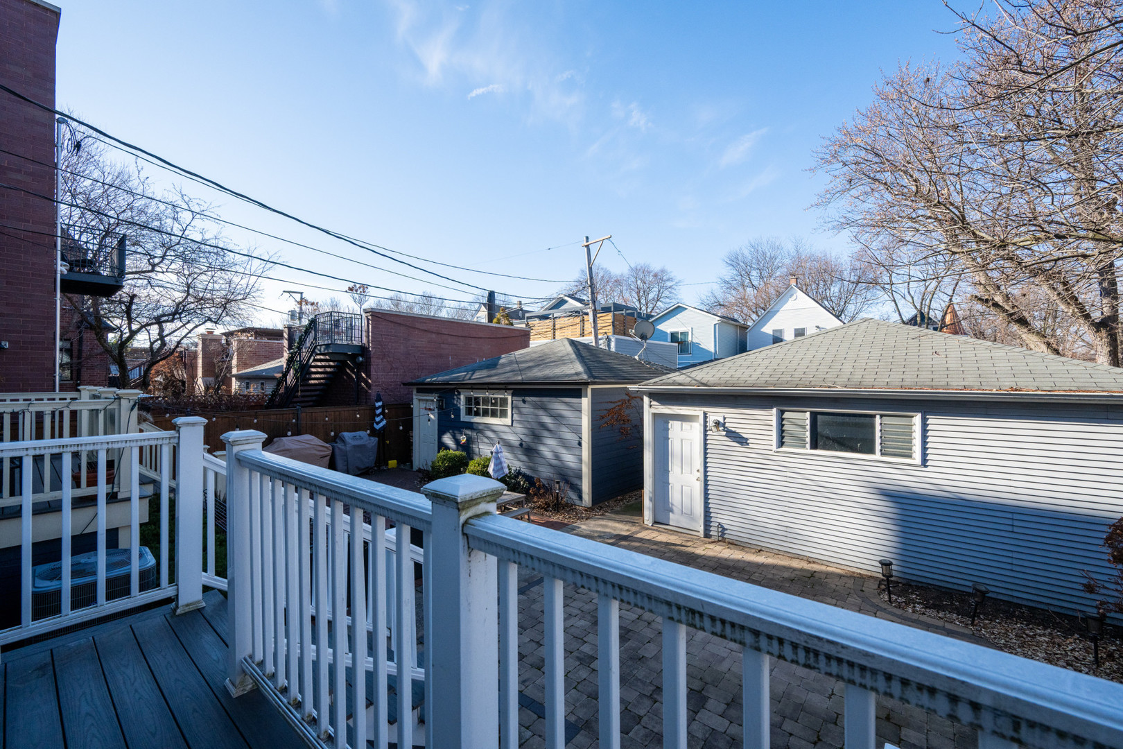 1701 West Byron Street Chicago, IL 60613 - Photo 54 of 57 a view of a house with a porch