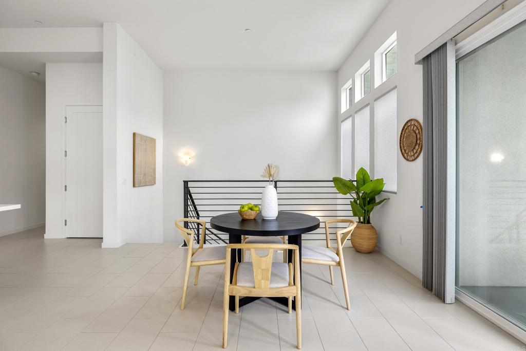 2026 Tango Loop, Unit 3 Chula Vista, CA 91915 - Photo 11 of 34 a dining room with furniture and potted plant