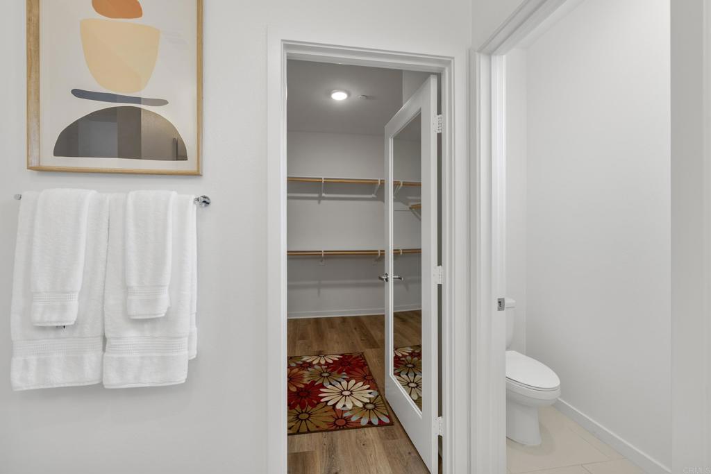 2026 Tango Loop, Unit 3 Chula Vista, CA 91915 - Photo 18 of 34 a bathroom with a toilet and a sink