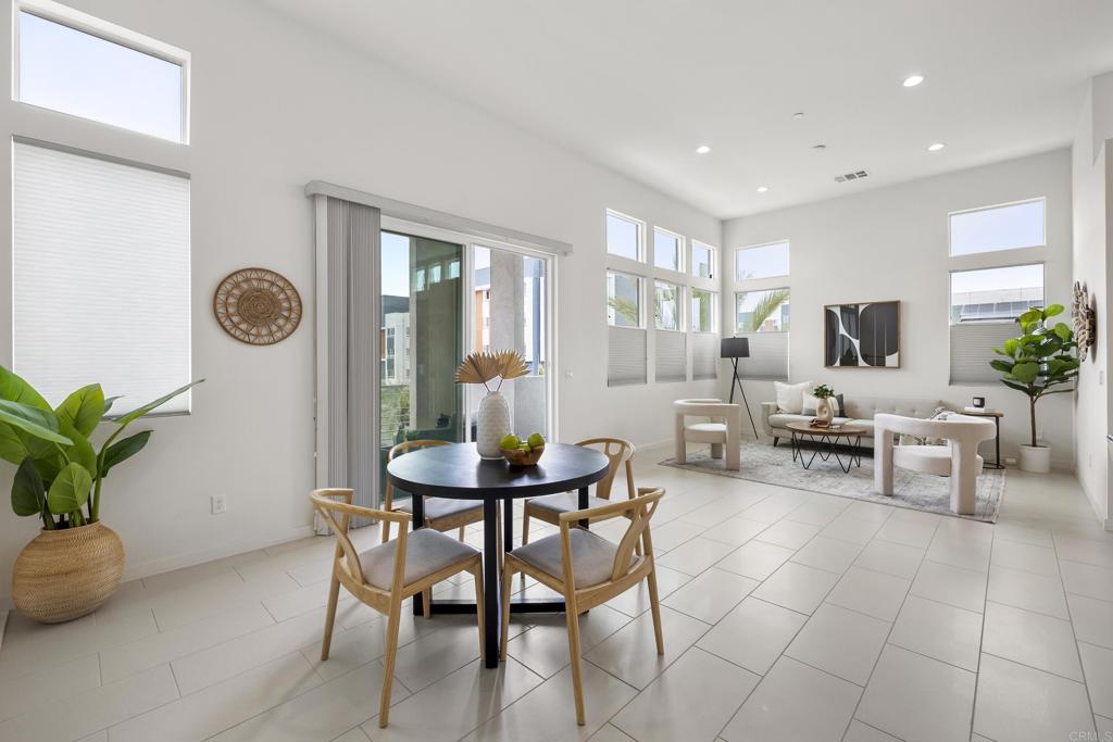 2026 Tango Loop, Unit 3 Chula Vista, CA 91915 - Photo 2 of 34 a living room with furniture and a potted plant