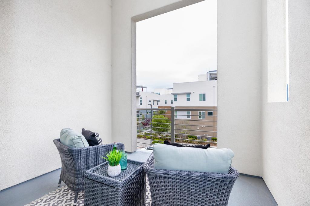 2026 Tango Loop, Unit 3 Chula Vista, CA 91915 - Photo 21 of 34 a living room with furniture and a window