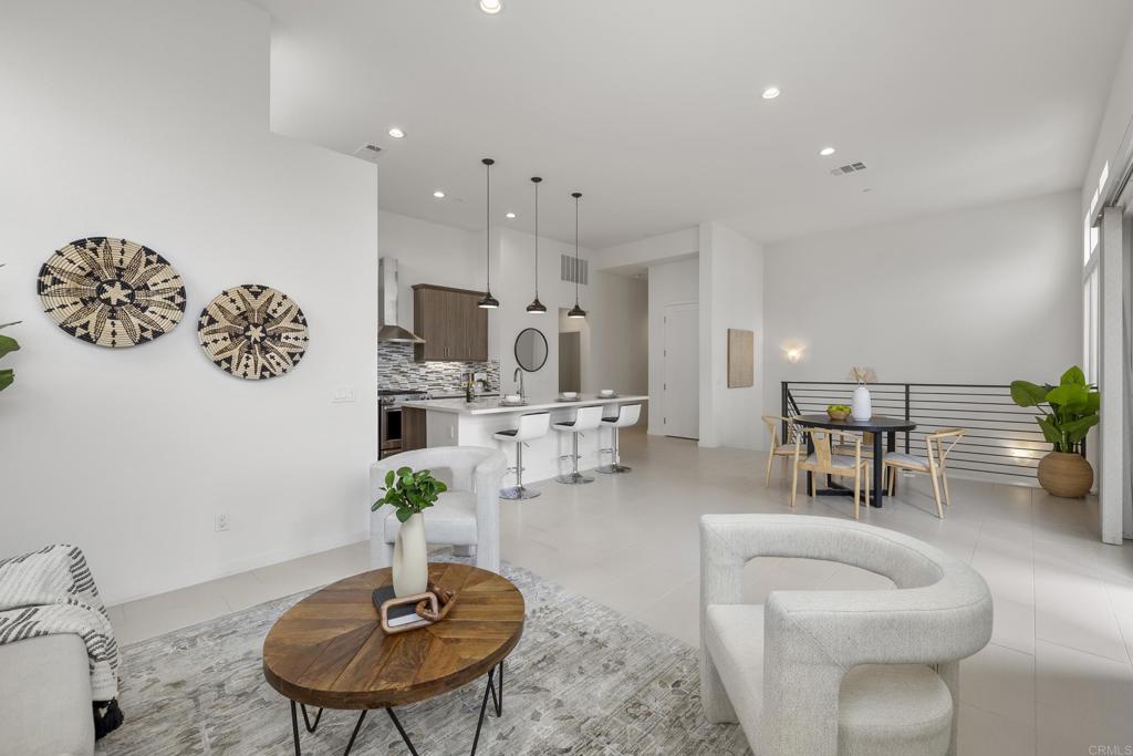 2026 Tango Loop, Unit 3 Chula Vista, CA 91915 - Photo 22 of 34 a living room with furniture potted plant and a table