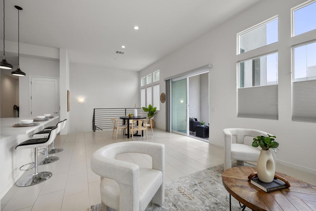 2026 Tango Loop, Unit 3 Chula Vista, CA 91915 - Photo 23 of 34 a living room with furniture and wooden floor