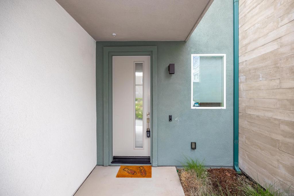 2026 Tango Loop, Unit 3 Chula Vista, CA 91915 - Photo 32 of 34 a view of bathroom with a sink and shower