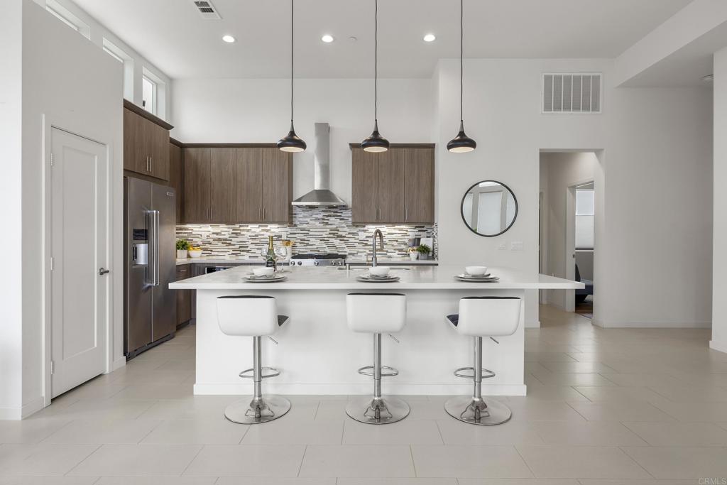 2026 Tango Loop, Unit 3 Chula Vista, CA 91915 - Photo 4 of 34 a kitchen with counter space cabinets and appliances