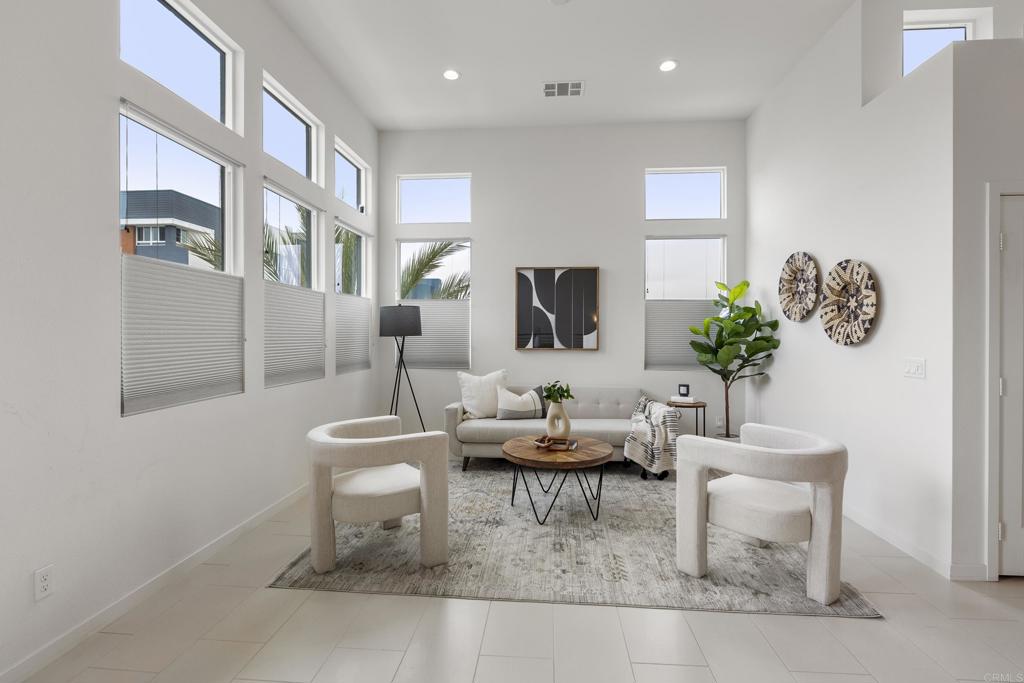 2026 Tango Loop, Unit 3 Chula Vista, CA 91915 - Photo 8 of 34 a living room with furniture and a potted plant