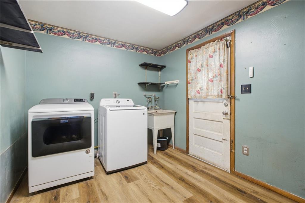 471 Beech Road Pittsburgh, PA 15239 - Photo 15 of 38 Main floor laundry room with exit to back yard.