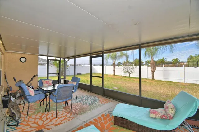 a view of a house with a yard and garage