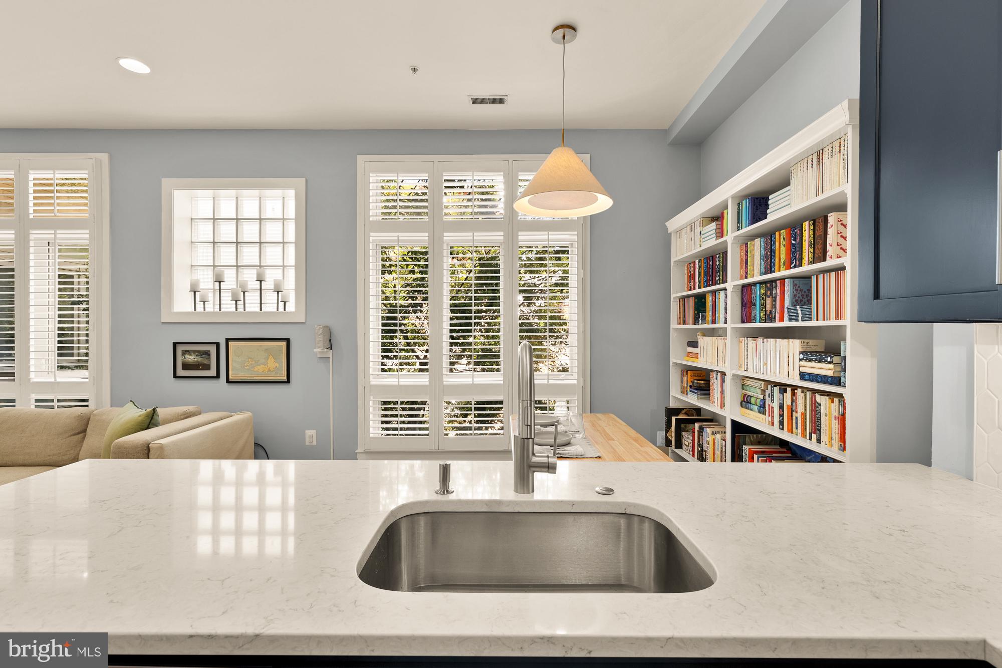 2363 Champlain Street Northwest, Unit 26 Washington, DC 20009 - Photo 11 of 35 a view of kitchen with furniture and large window