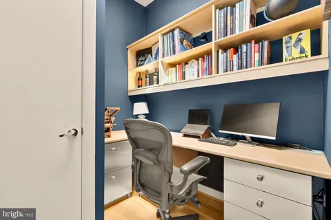 a view of a workspace with furniture