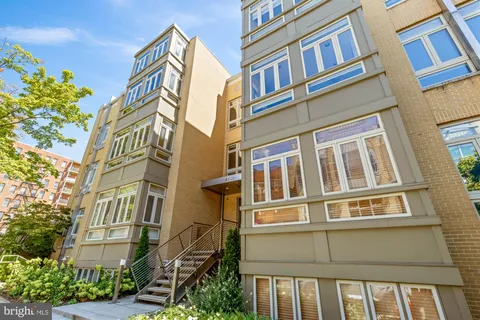 a front view of a multi story residential apartment building