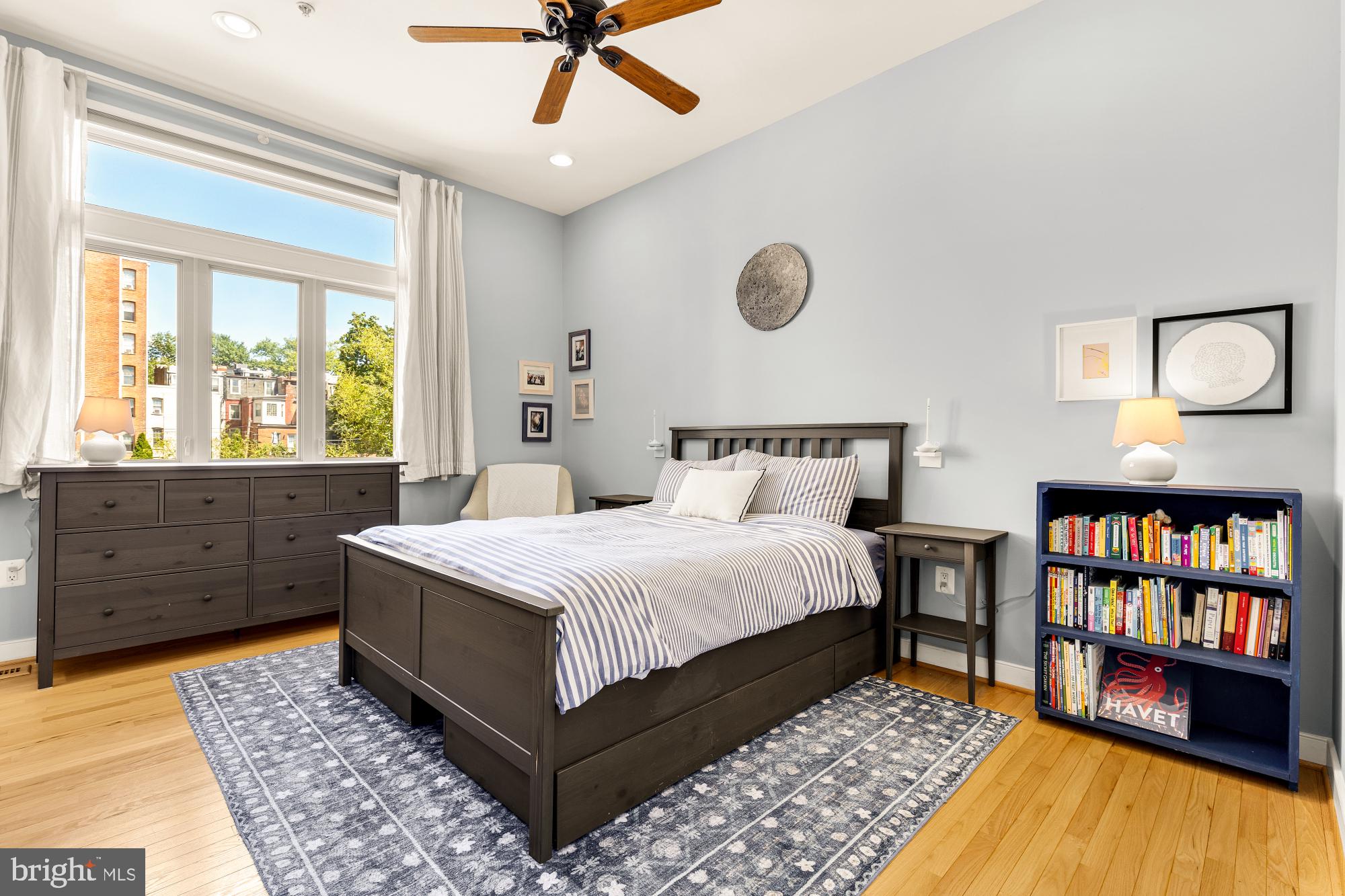2363 Champlain Street Northwest, Unit 26 Washington, DC 20009 - Photo 21 of 35 a bedroom with a large bed and a window
