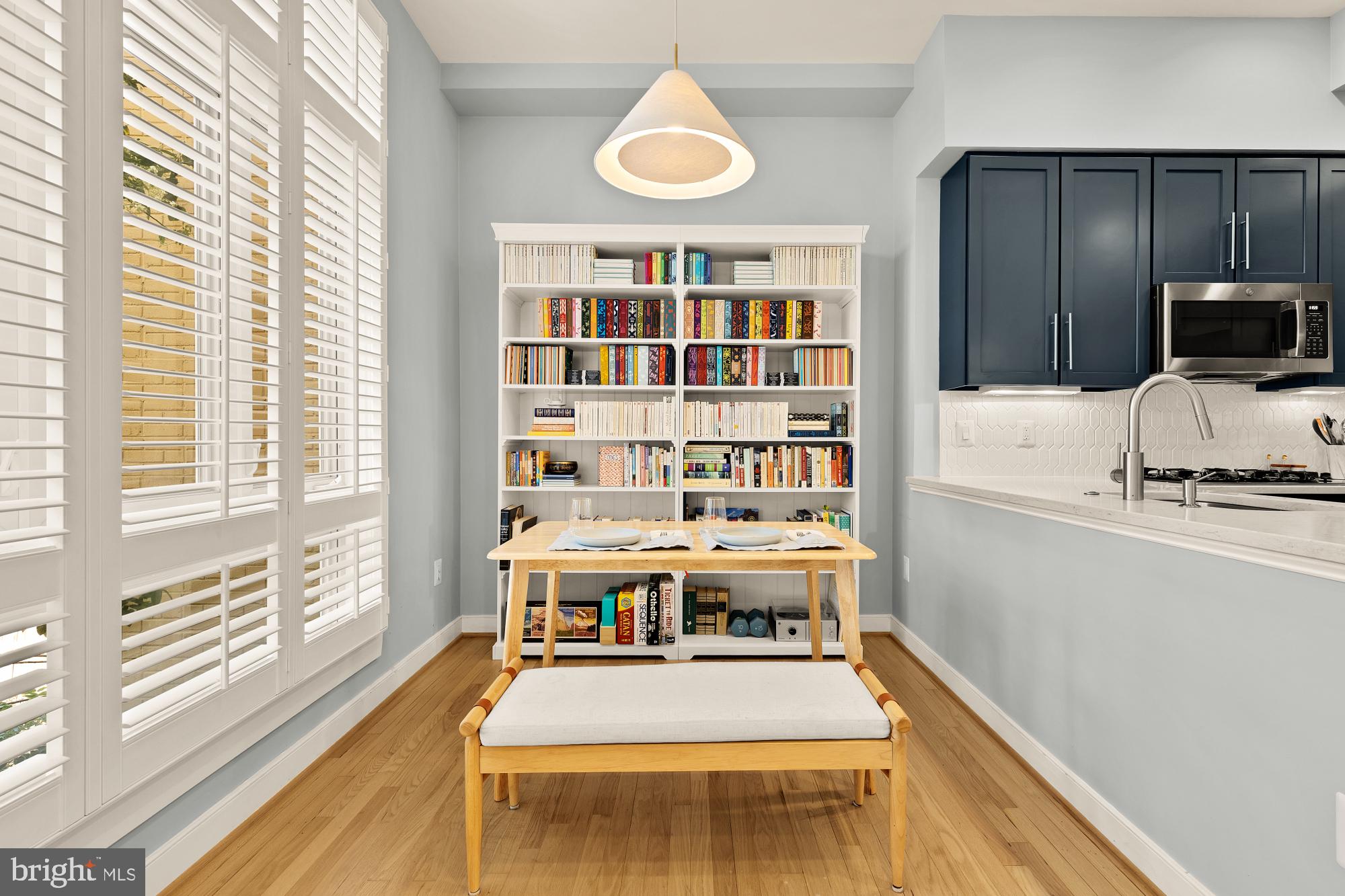 2363 Champlain Street Northwest, Unit 26 Washington, DC 20009 - Photo 8 of 35 a large white kitchen with a large window
