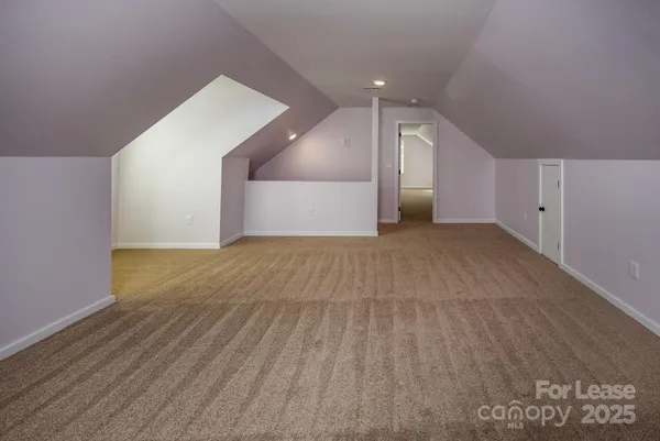 a view of a big room with wooden floor