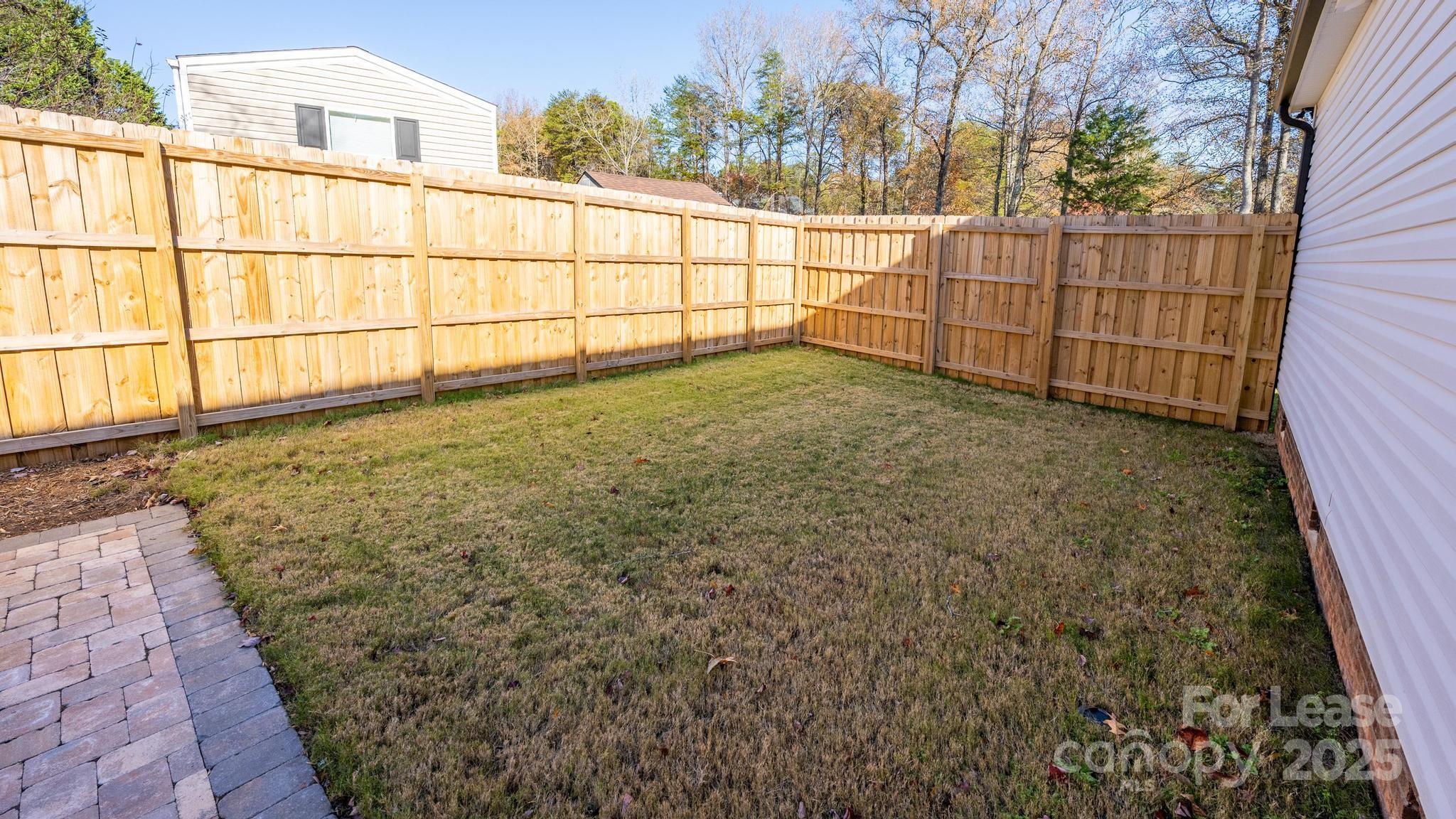 7039 Executive Circle Denver, NC 28037 - Photo 39 of 48 a view of a backyard