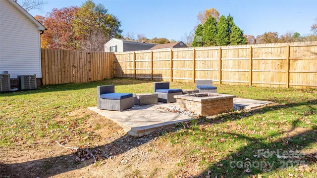 a view of a swimming pool with a lounge chairs