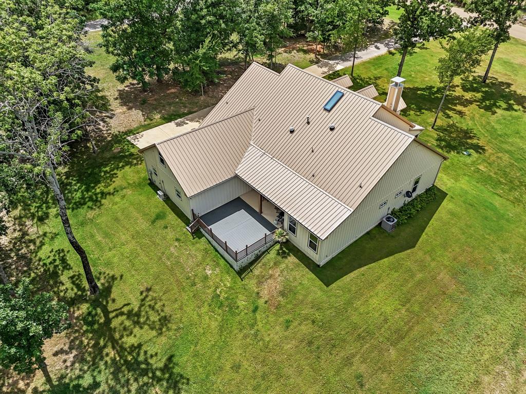5230 Esquire Estates Road Mabank, TX 75156 - Photo 16 of 19 an aerial view of residential house with outdoor space and trees