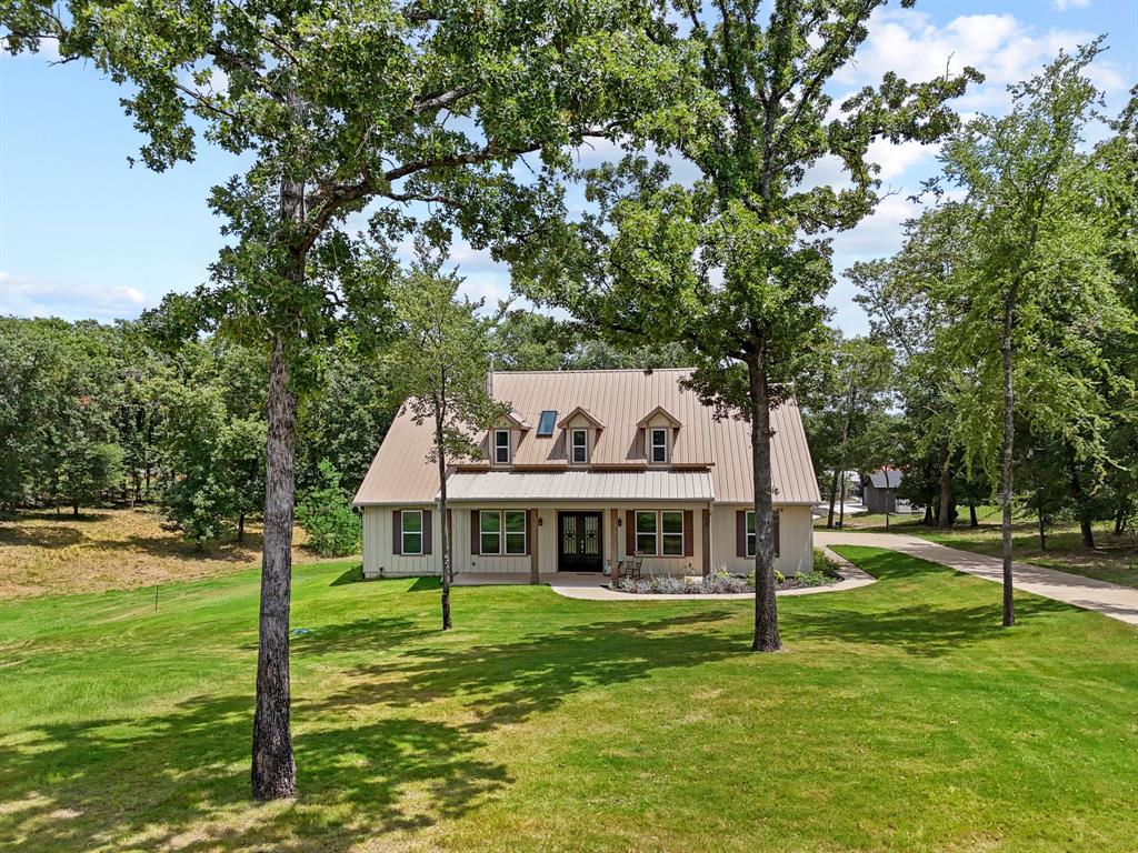 5230 Esquire Estates Road Mabank, TX 75156 - Photo 19 of 19 a front view of a house with a yard