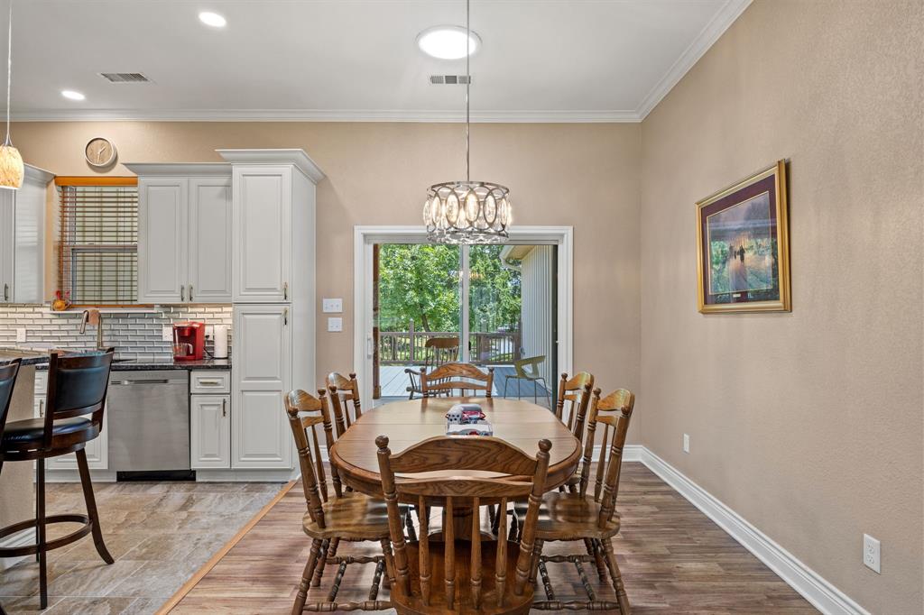 5230 Esquire Estates Road Mabank, TX 75156 - Photo 7 of 19 a view of a dining room with furniture window and outside view